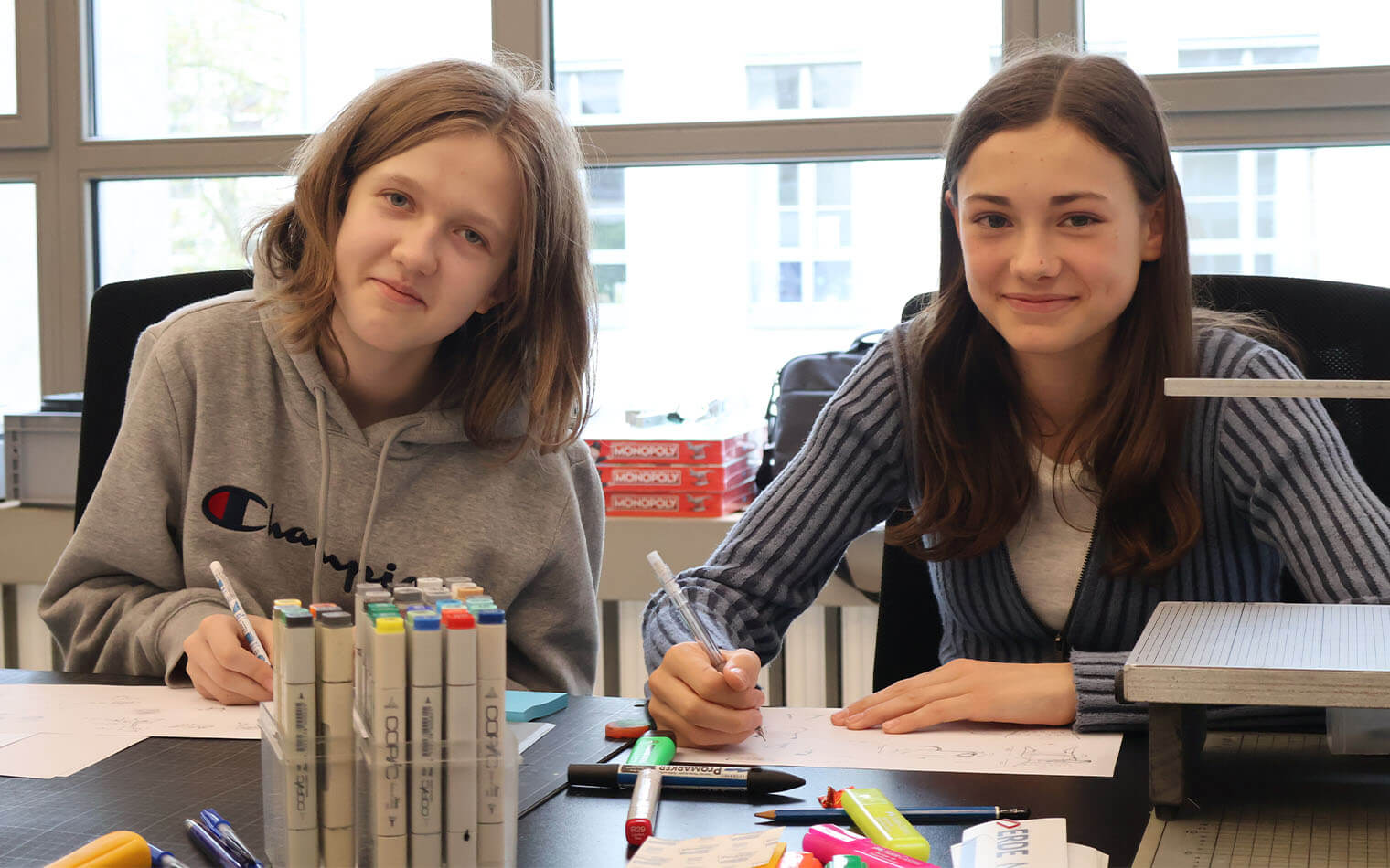 The two students developing a concept together.