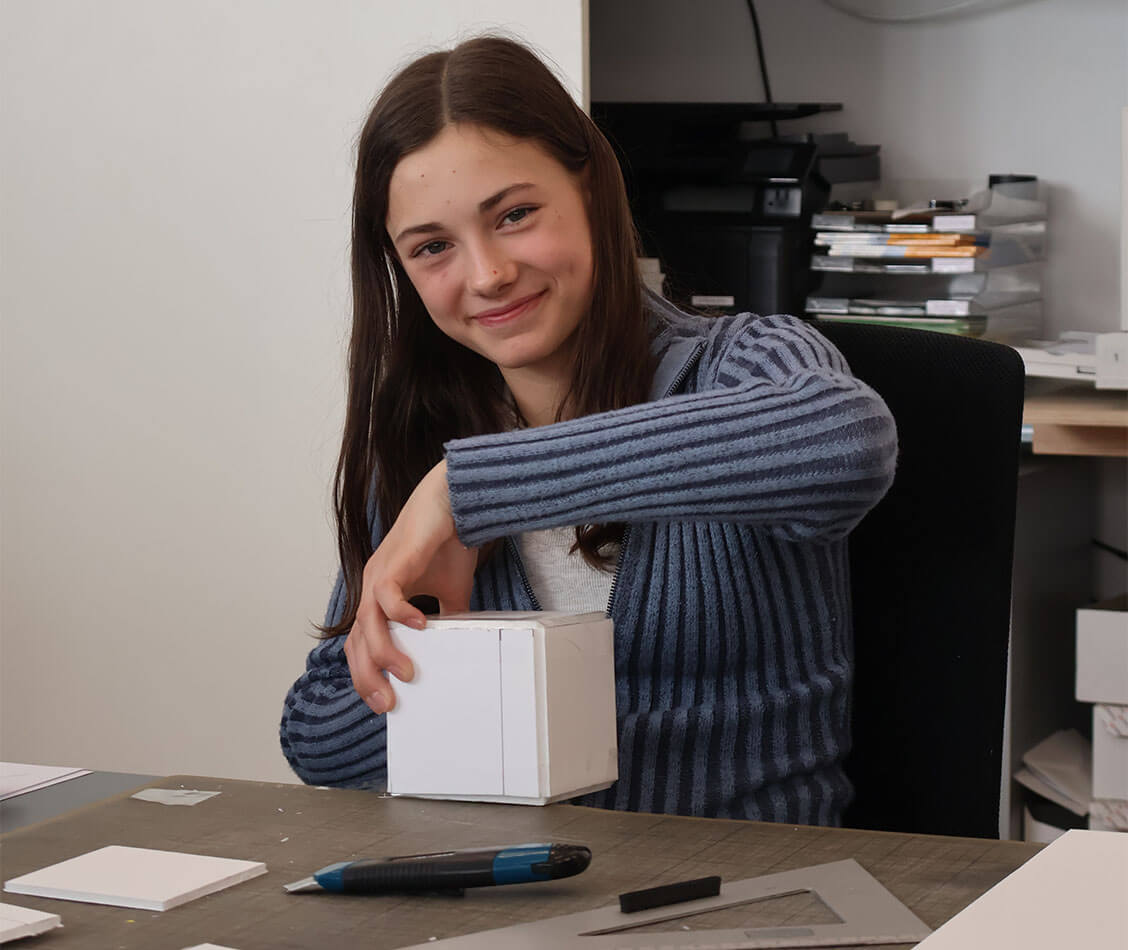 The student building a model.